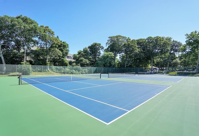 view of sport court with fence and community basketball court