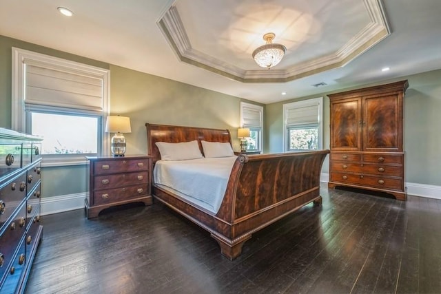 187 Lakeview Ave, Rockville Centre, NY 11570 - bedroom featuring a tray ceiling, baseboards, dark wood-type flooring, ornamental molding, and recessed lighting