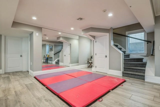187 Lakeview Ave, Rockville Centre, NY 11570 - workout room with wood finished floors, baseboards, and recessed lighting