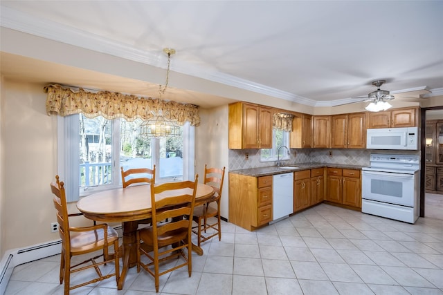 kitchen featuring a sink, light tile patterned floors, tasteful backsplash, white appliances, and ornamental molding
