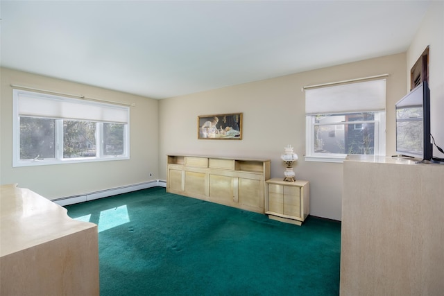 interior space featuring carpet and a baseboard heating unit