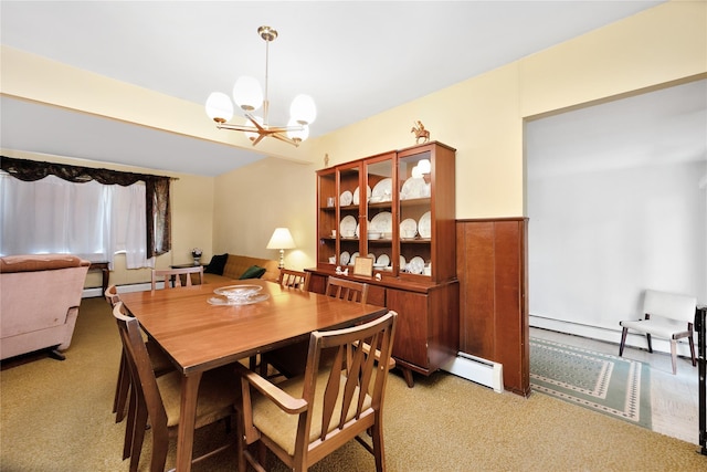 1 Magenta St, Hicksville, NY 11801 - dining space with light colored carpet, a chandelier, and baseboard heating