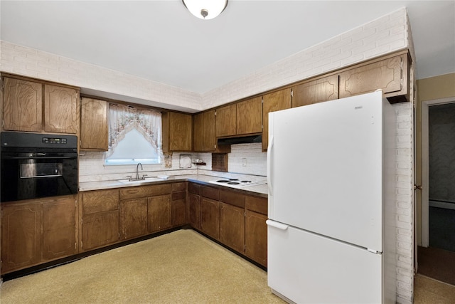 1 Magenta St, Hicksville, NY 11801 - kitchen featuring brown cabinetry, a sink, decorative backsplash, and white appliances