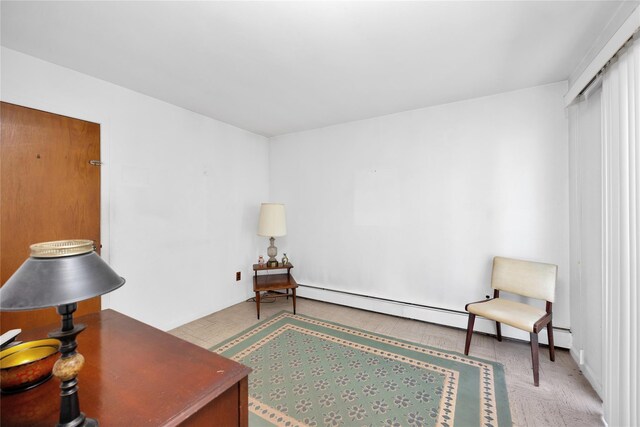 1 Magenta St, Hicksville, NY 11801 - sitting room featuring baseboards and baseboard heating