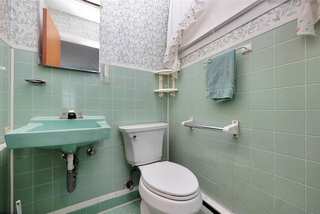 1 Magenta St, Hicksville, NY 11801 - bathroom featuring a sink, tile walls, tile patterned flooring, and toilet