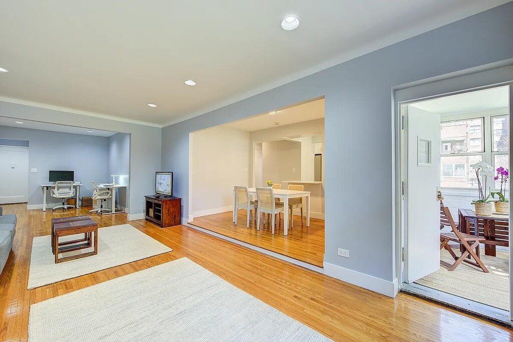 68-61 Yellowstone Blvd Unit 303, Forest Hills, NY 11375 - living area with baseboards, light wood finished floors, and recessed lighting