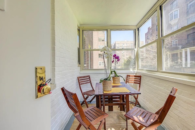 sunroom / solarium with a healthy amount of sunlight