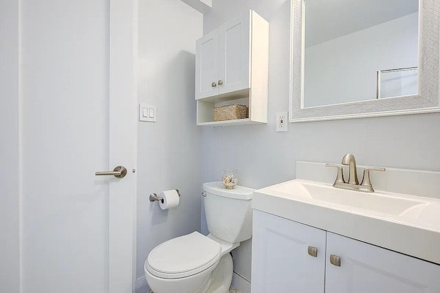 half bath with toilet and vanity