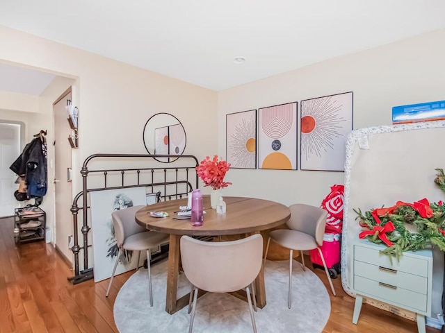 2027 Chatterton Ave, Bronx, NY 10472 - dining area with wood finished floors