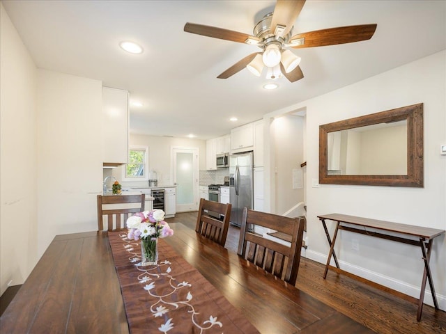 dining room featuring recessed lighting, ceiling fan, and dark wood-style flooring