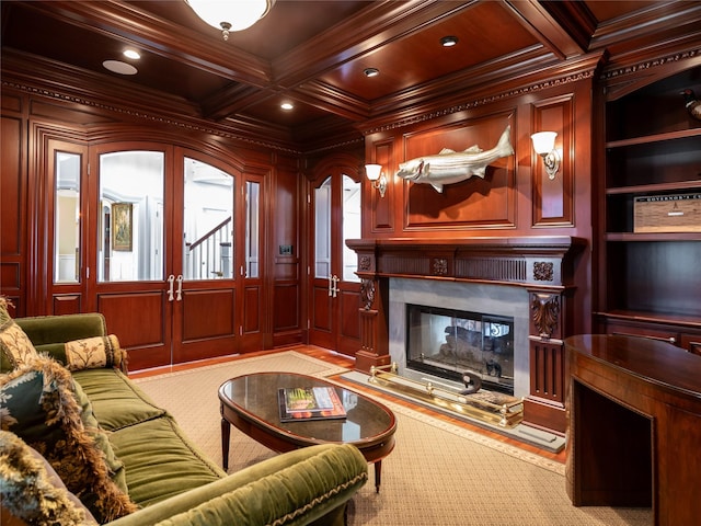 27 True Harbour Way W, Islip, NY 11795 - living room featuring ornamental molding, coffered ceiling, a premium fireplace, built in shelves, and recessed lighting