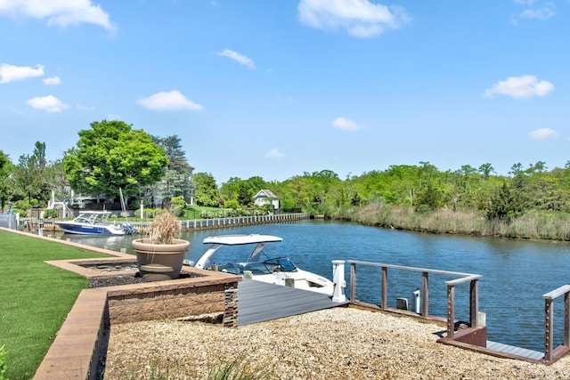 27 True Harbour Way W, Islip, NY 11795 - dock featuring a water view and a lawn