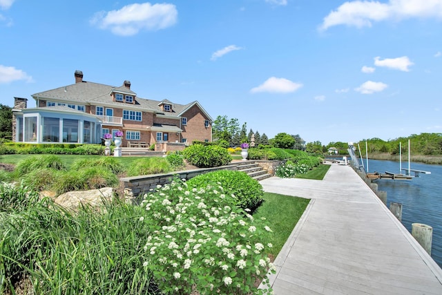 27 True Harbour Way W, Islip, NY 11795 - dock featuring boat lift and a water view