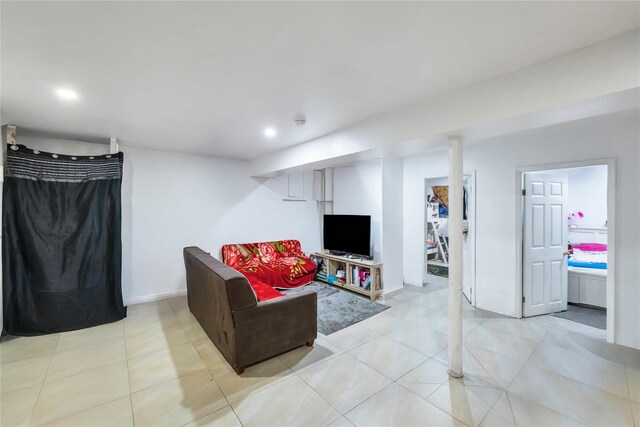 324 Ralph Ave, Brooklyn, NY 11233 - living room featuring recessed lighting and baseboards