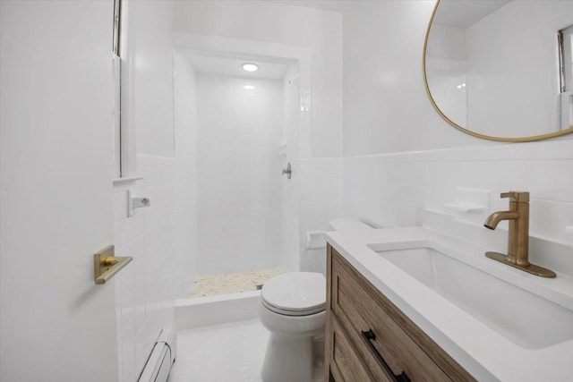 10 Mohawk Rd, Yonkers, NY 10710 - bathroom featuring toilet, vanity, a baseboard radiator, and a tile shower