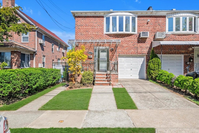 143-07 Rose Ave, Flushing, NY 11355 - view of front of property featuring brick siding, an attached garage, and driveway