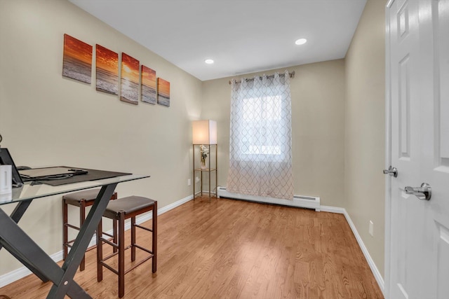 143-07 Rose Ave, Flushing, NY 11355 - office featuring baseboard heating, baseboards, light wood-style flooring, and recessed lighting