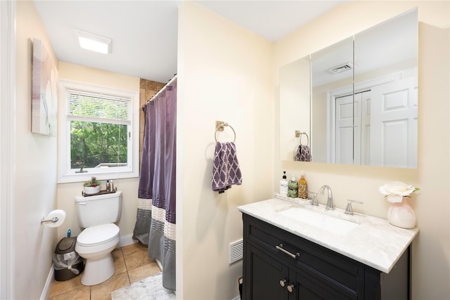 full bath featuring toilet, tile patterned floors, visible vents, baseboards, and vanity