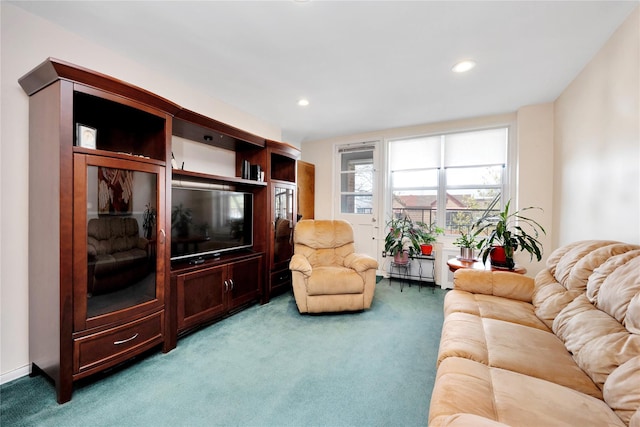 carpeted living room featuring recessed lighting