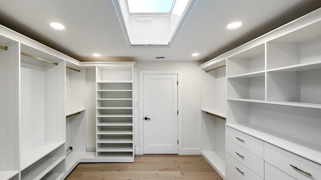 walk in closet featuring light wood-type flooring