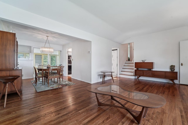 103 S Nauraushaun Rd, Pearl River, NY 10965 - living area with a chandelier, baseboards, wood finished floors, and lofted ceiling