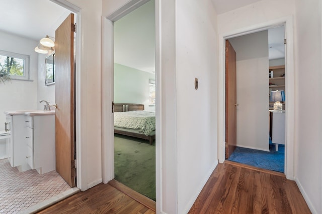 103 S Nauraushaun Rd, Pearl River, NY 10965 - hallway featuring wood finished floors and baseboards