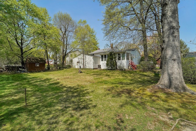 103 S Nauraushaun Rd, Pearl River, NY 10965 - view of yard with a storage shed and an outdoor structure