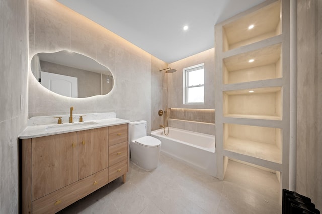 13107 229th St, Laurelton, NY 11413 - bathroom with tile walls, shower / bath combination, vanity, and toilet