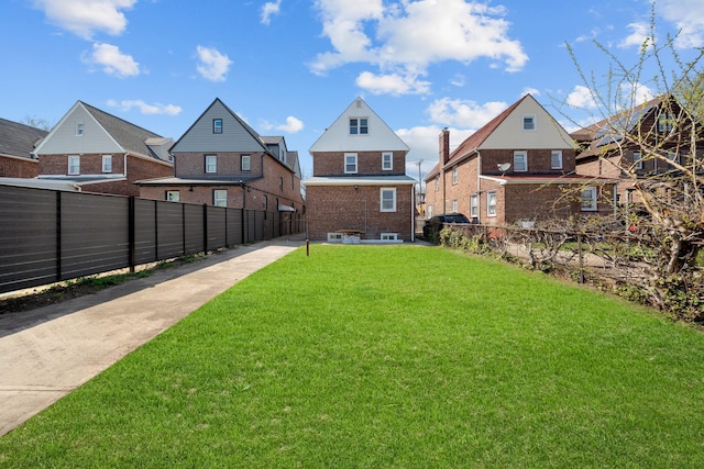 13107 229th St, Laurelton, NY 11413 - view of yard featuring a residential view and fence private yard