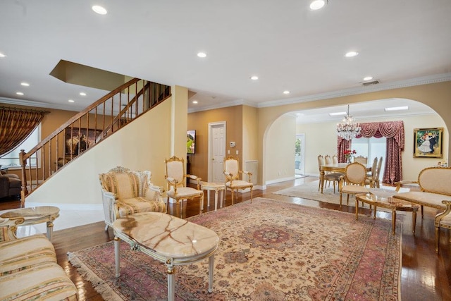 44 Netz Pl, Albertson, NY 11507 - living area with baseboards, visible vents, arched walkways, and stairway