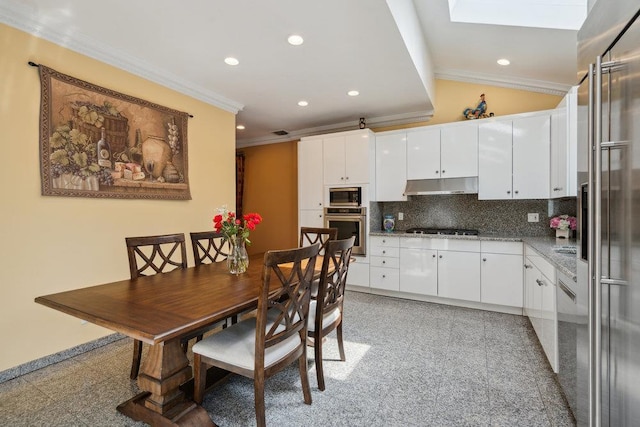 44 Netz Pl, Albertson, NY 11507 - kitchen featuring under cabinet range hood, granite finish floor, appliances with stainless steel finishes, and crown molding