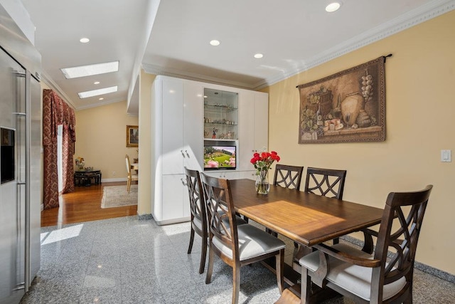 44 Netz Pl, Albertson, NY 11507 - dining area featuring recessed lighting, granite finish floor, baseboards, ornamental molding, and a skylight