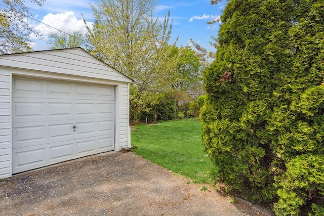44 Netz Pl, Albertson, NY 11507 - detached garage featuring aphalt driveway