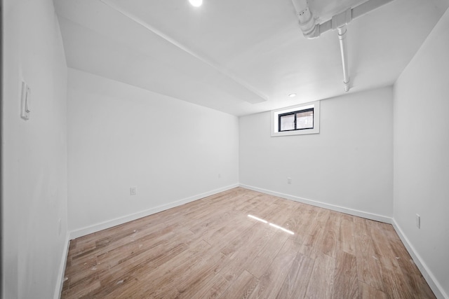 22518 Mentone Ave, Laurelton, NY 11413 - below grade area featuring baseboards and wood finished floors