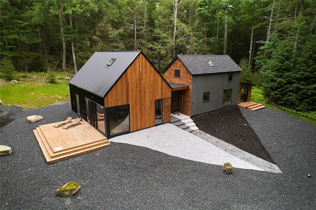 64 Hoyt Rd, Glen Spey, NY 12737 - view of front of house with a wooded view