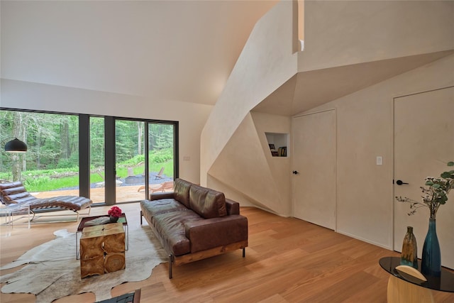 64 Hoyt Rd, Glen Spey, NY 12737 - living area with high vaulted ceiling and light wood-type flooring