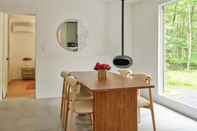 64 Hoyt Rd, Glen Spey, NY 12737 - dining space with a wall mounted AC and baseboards