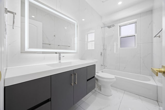 full bath featuring vanity,  shower combination, marble finish floor, toilet, and recessed lighting