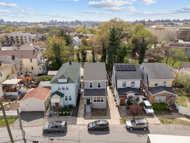 birds eye view of property with a residential view