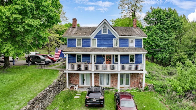 57 River Ave, Cornwall On Hudson, NY 12520 - rear view of property featuring french doors, a yard, a chimney, and brick siding