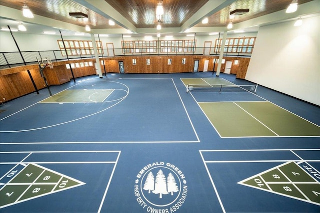 interior space with fence, community basketball court, and a tennis court