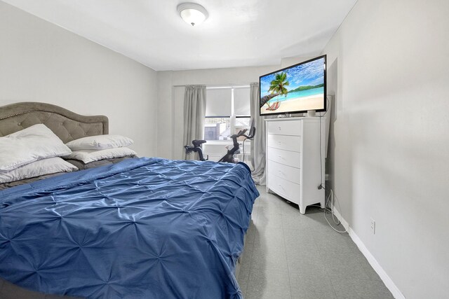 3130 Irwin Ave Unit 2C, Bronx, NY 10463 - bedroom featuring baseboards and tile patterned floors