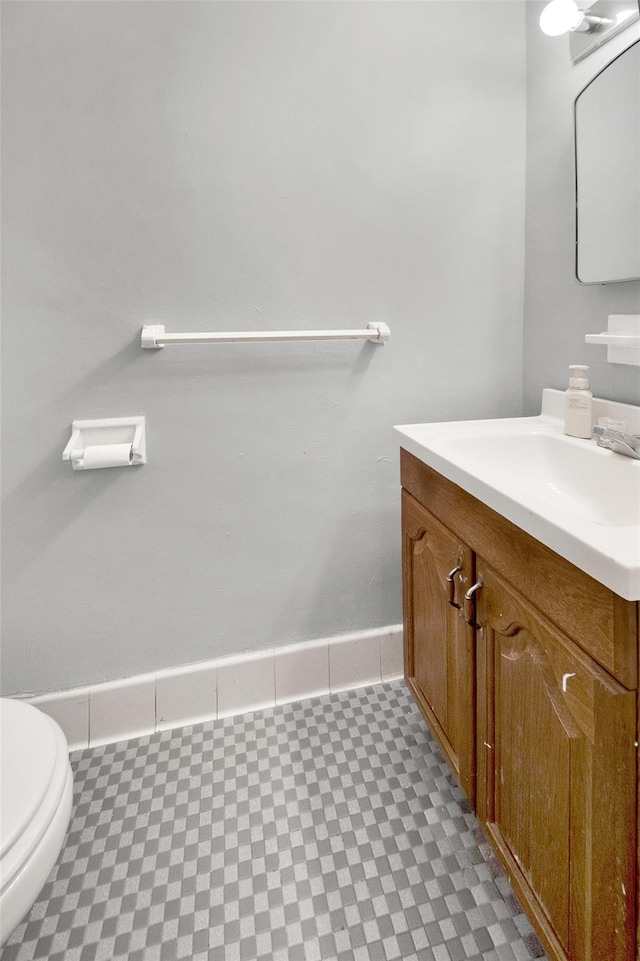 3130 Irwin Ave Unit 2C, Bronx, NY 10463 - half bath with tile patterned floors, baseboards, vanity, and toilet