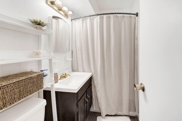 3130 Irwin Ave Unit 2C, Bronx, NY 10463 - full bath with a shower with curtain, decorative backsplash, vanity, and toilet
