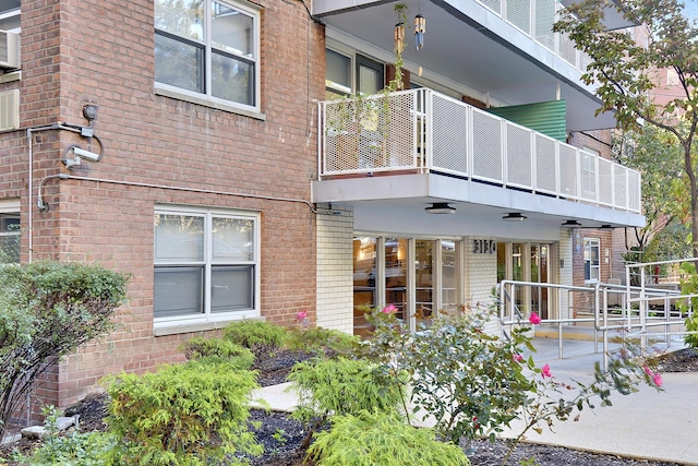 3130 Irwin Ave Unit 2C, Bronx, NY 10463 - rear view of house with a balcony and brick siding