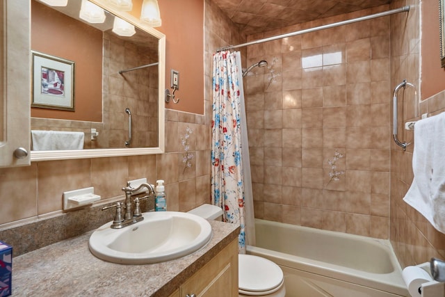 full bath with shower / bathtub combination with curtain, vanity, toilet, and tile walls