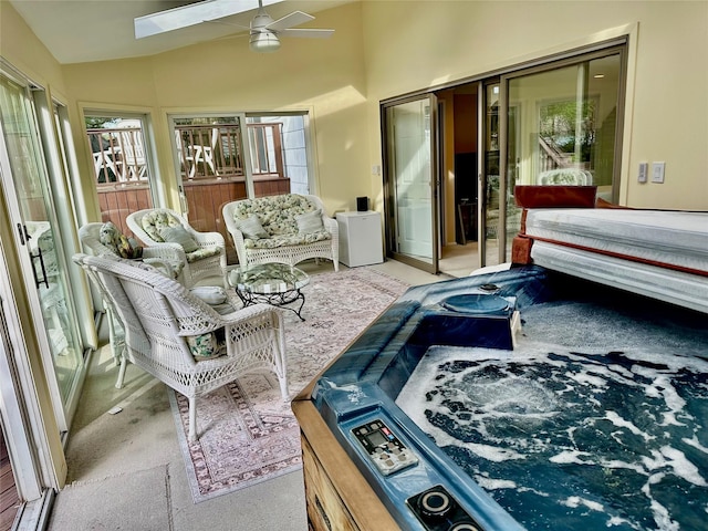 carpeted bedroom featuring vaulted ceiling with skylight
