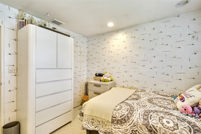 bedroom with recessed lighting and visible vents