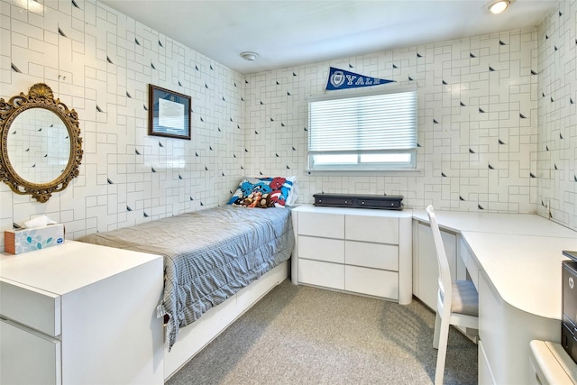 bedroom with tile walls