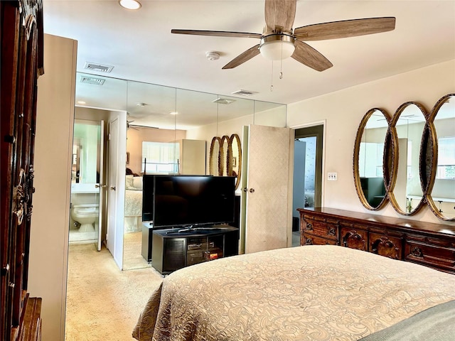 bedroom with visible vents, ensuite bath, and recessed lighting
